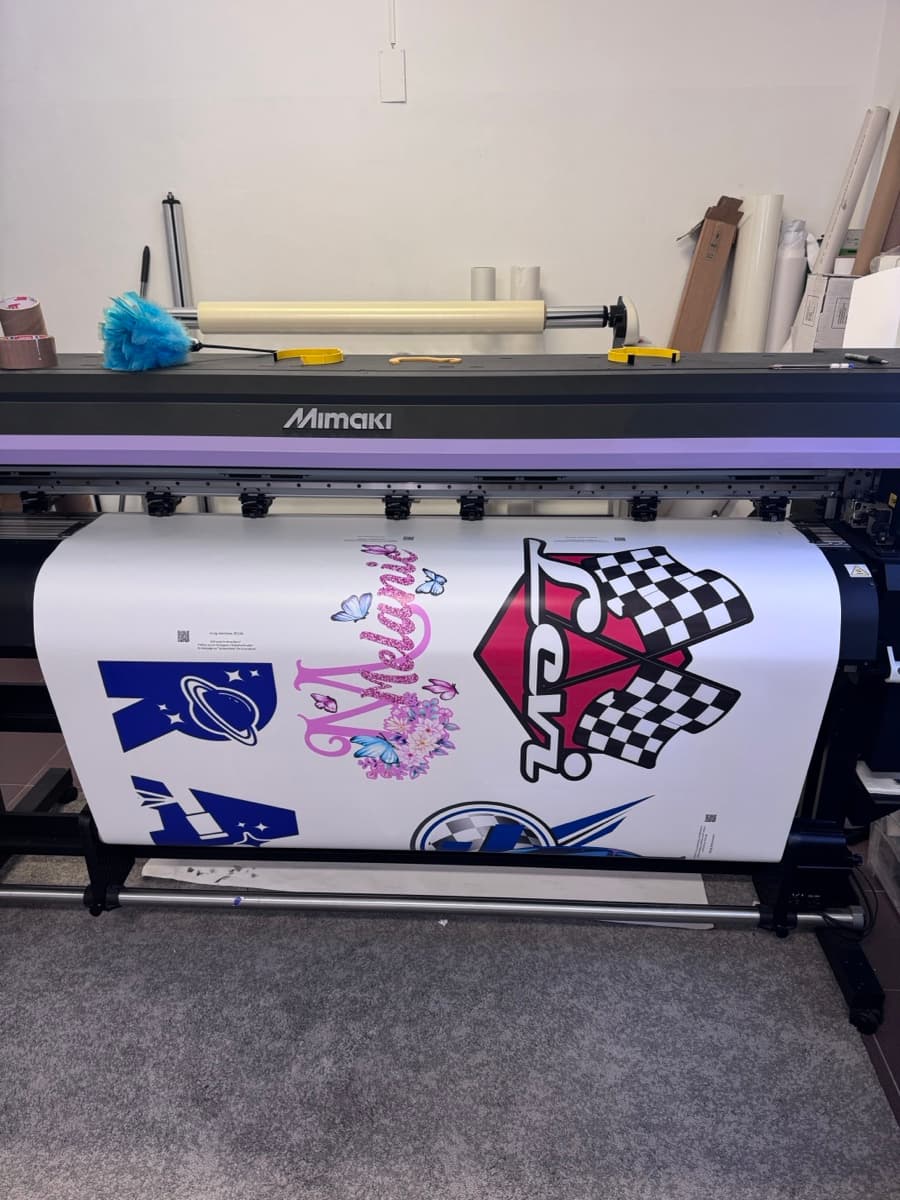 Large format printer producing custom wall decals
