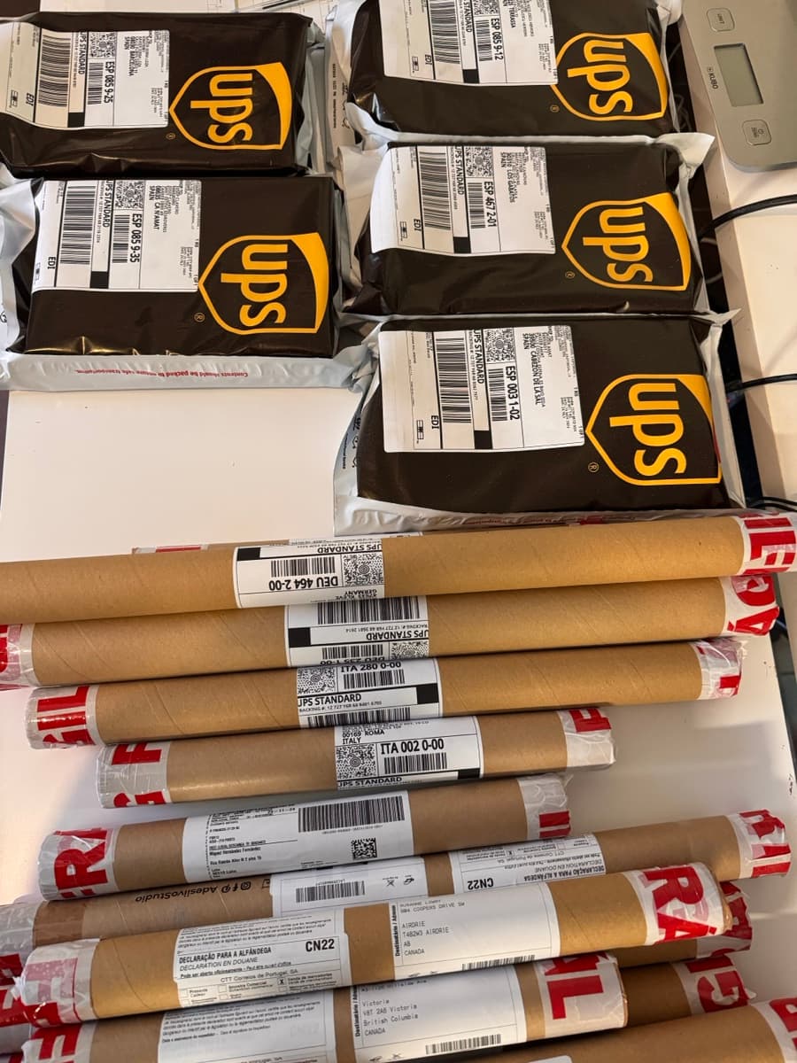 UPS packages and shipping tubes ready for international delivery