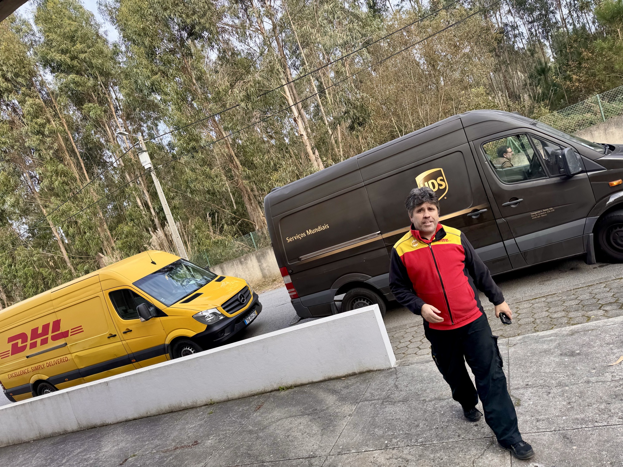 UPS and DHL picking up the day's orders